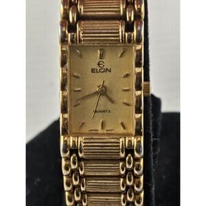ELGIN Ladies gold tone rectangle case champagne dial
